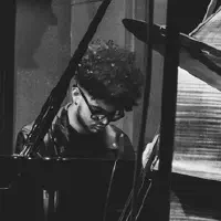 Tyler Bullock II playing Piano at Theo Croker concert