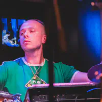 Mackwood playing drums