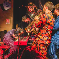 The whole band (almost) around the keyboard player