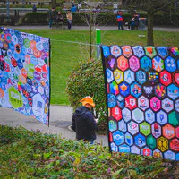 Someone with a VLC cone hat, but it is not standing up right.