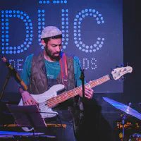Pablo Aguste playing bass