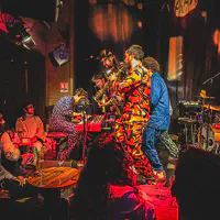 The whole band (almost) around the keyboard player