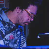 Tony Tixier playing piano