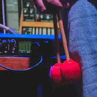 Alexis Valet waiting with his mallets along the leg